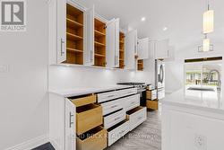 Kitchen cabinets-lots of pull-outs/pot drawers -