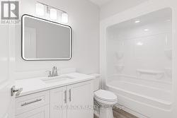 4-piece bathroom off main hall -