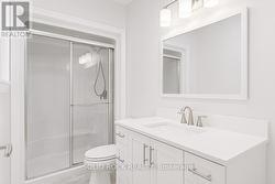 Primary Bedroom 3-Piece Bath with quartz c-tops -