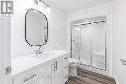 Lower level 3-pc bath with quartz countertops -