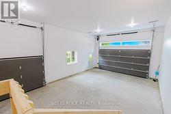 14 ft garage ceilings, fully insulated/drywalled -