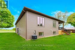 Big windows-James Hardie siding-Central air unit -