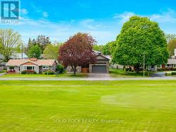 Exterior Front looking northwest from golf course -