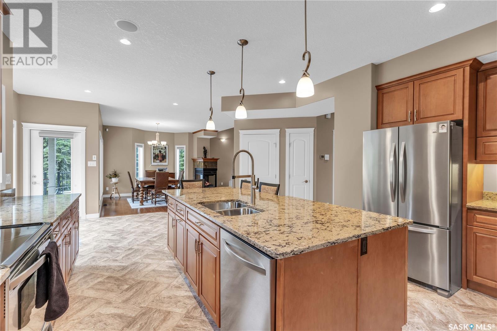 Estates Drive, Elk Ridge, SK - Indoor Photo Showing Kitchen With Stainless Steel Kitchen With Double Sink With Upgraded Kitchen
