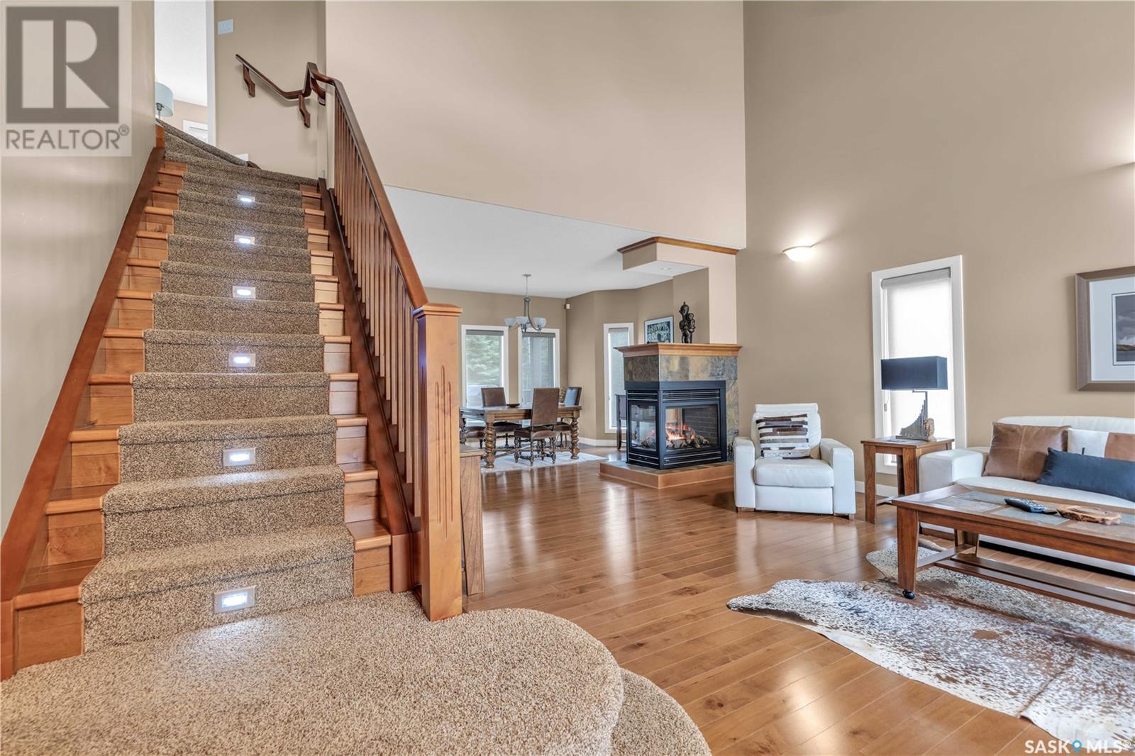 Estates Drive, Elk Ridge, SK - Indoor With Fireplace