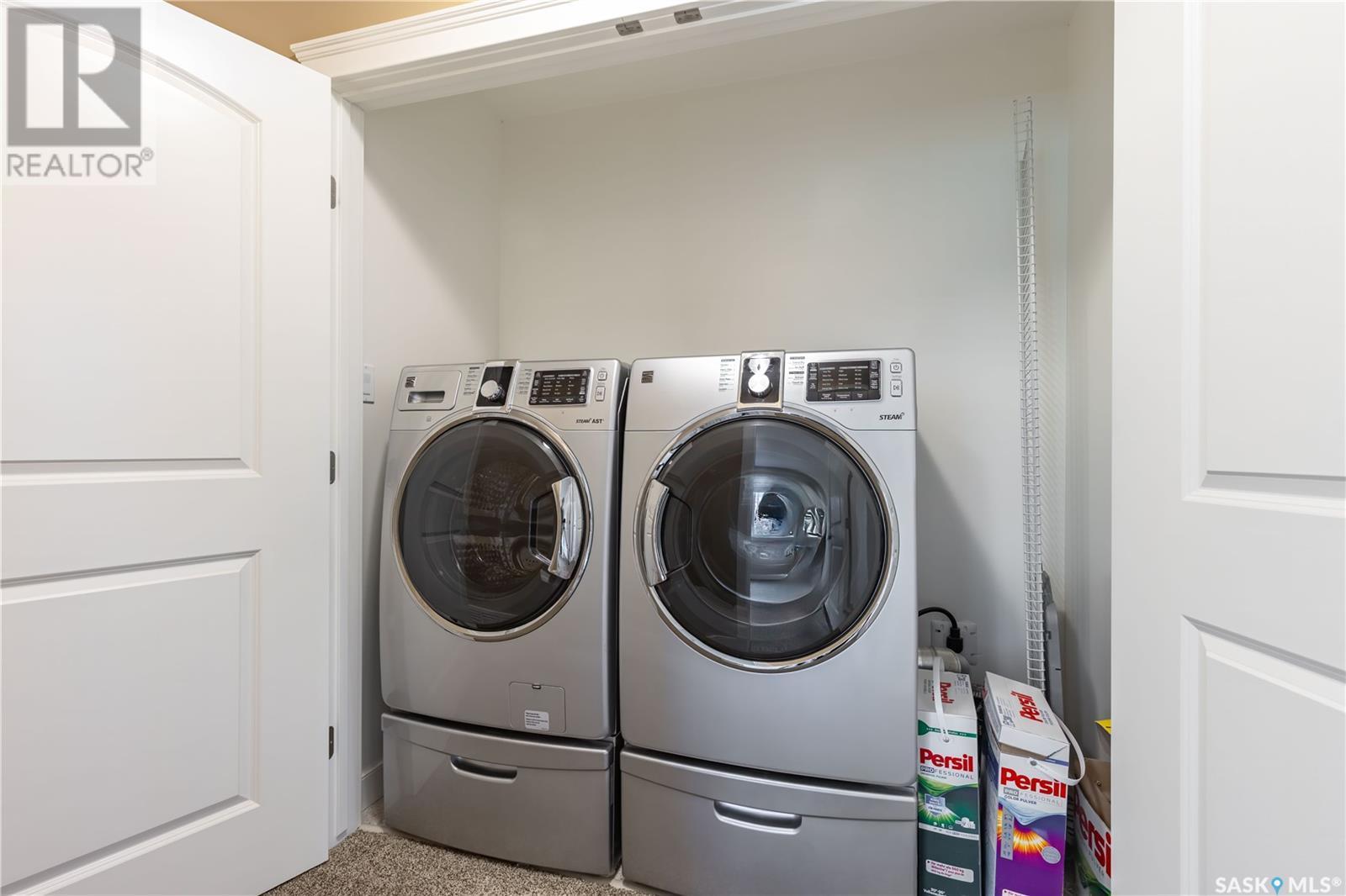 Estates Drive, Elk Ridge, SK - Indoor Photo Showing Laundry Room