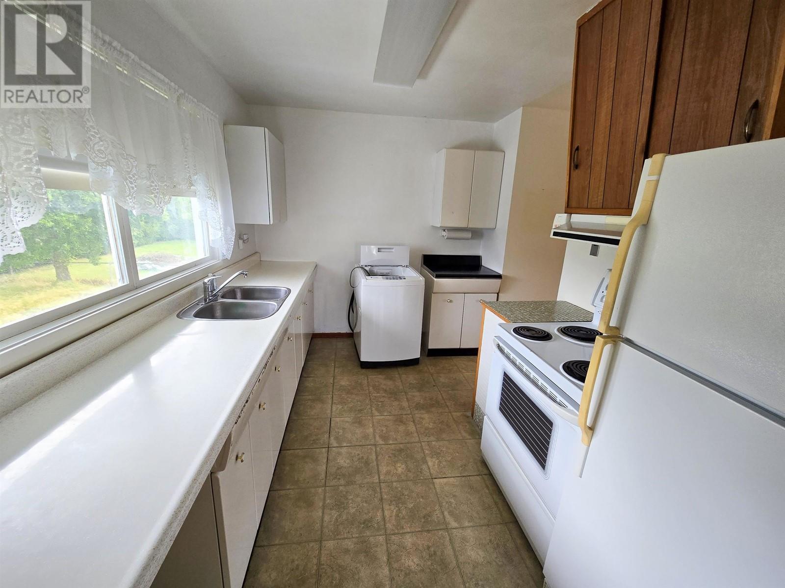 99 Mallard Street, Kitimat, BC - Indoor Photo Showing Kitchen With Double Sink
