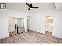 primary bedroom with walk in closet and 3 piece en-suite -