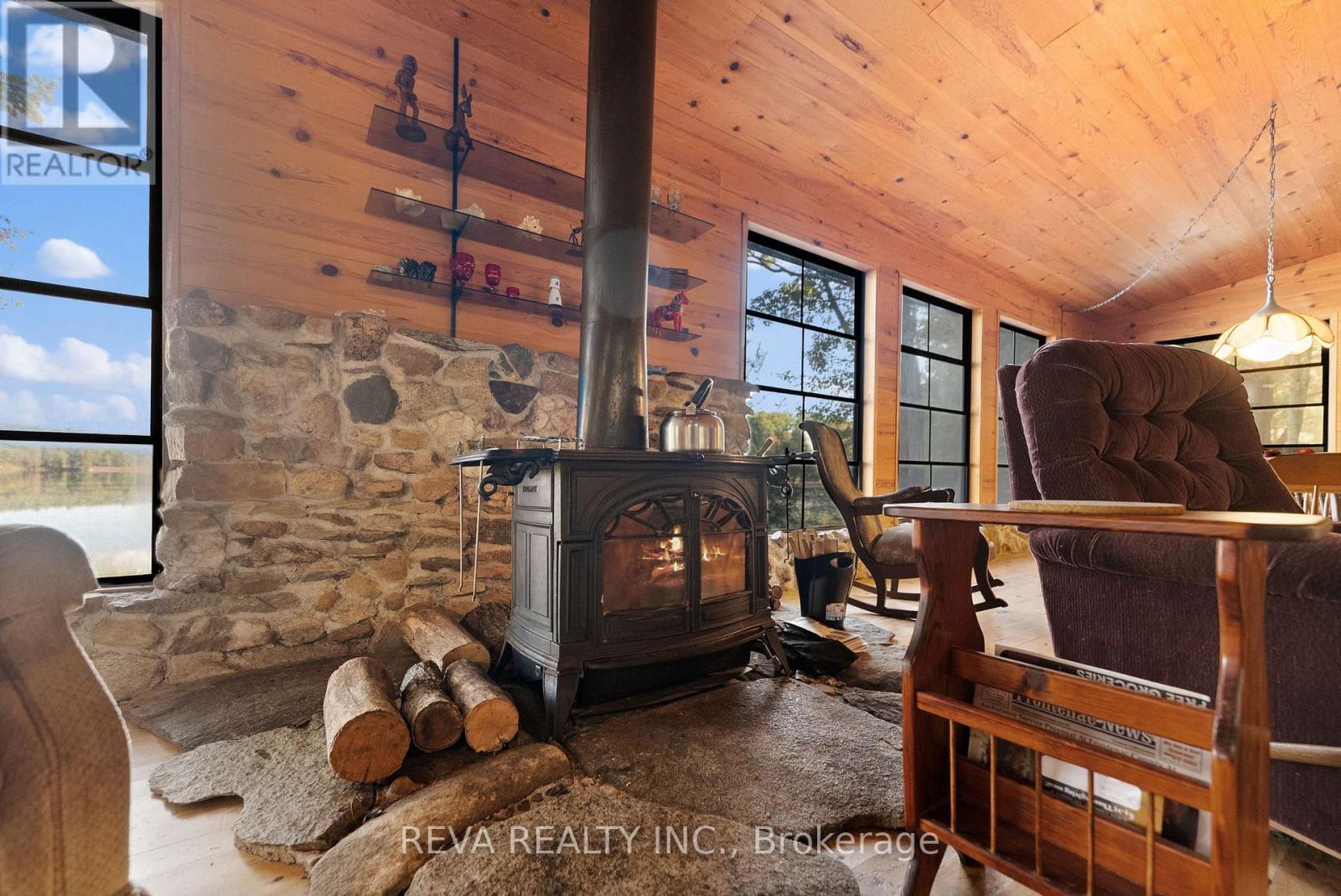 368 Addington Road, Addington Highlands (Addington Highlands), ON - Indoor Photo Showing Other Room With Fireplace