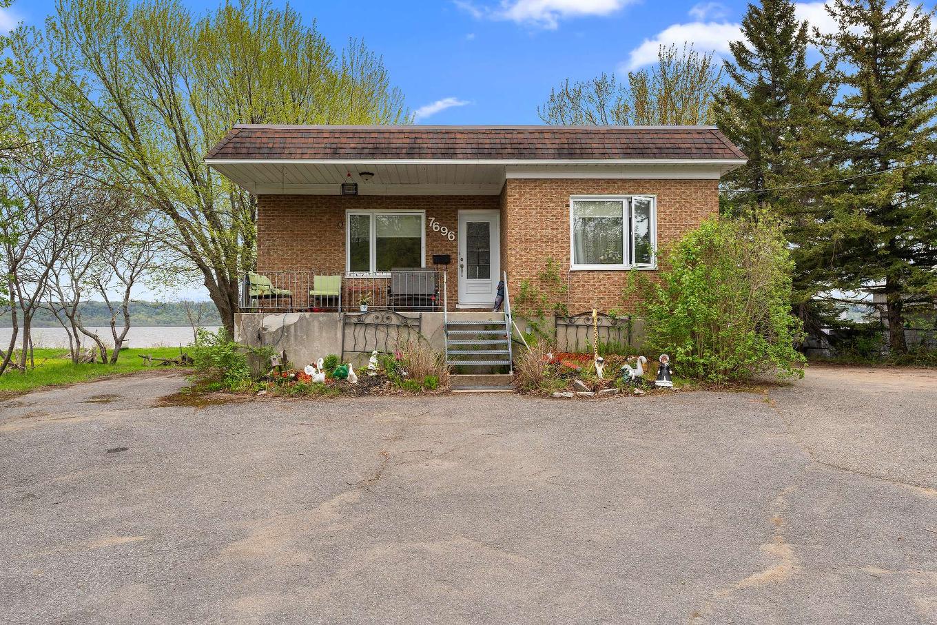 Façade - 7696 Boul. Ste-Anne, Château-Richer, QC - Outdoor With Deck Patio Veranda