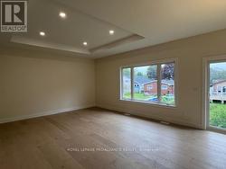 Living Room with tray ceiliig -