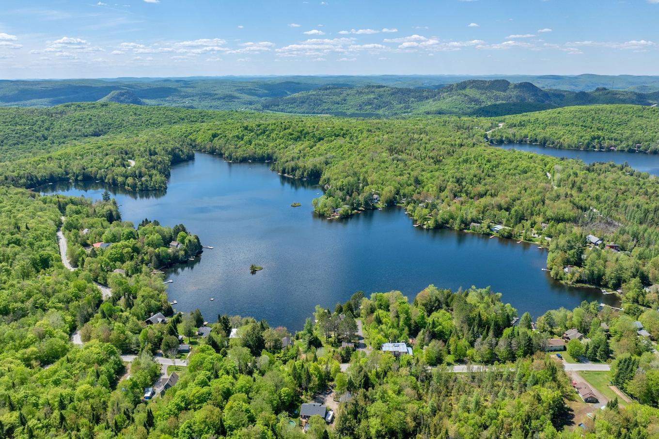 Aerial photo - 494 Ch. Léo-Bouvrette, Mont-Tremblant, QC - Outdoor With Body Of Water With View