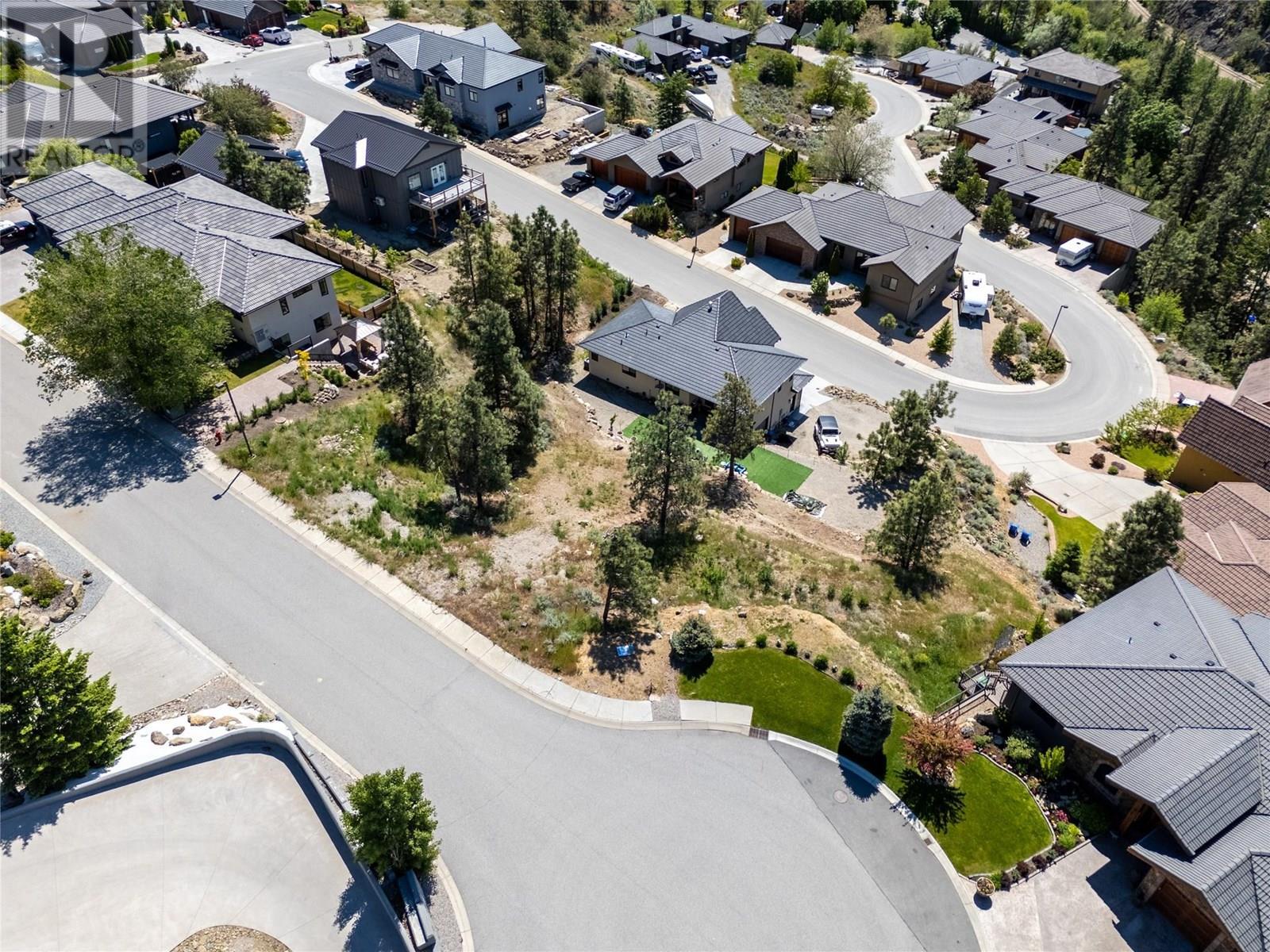 View of lot & neighbourhood. - 6709 Victoria Road S Lot# 13, Summerland, BC
