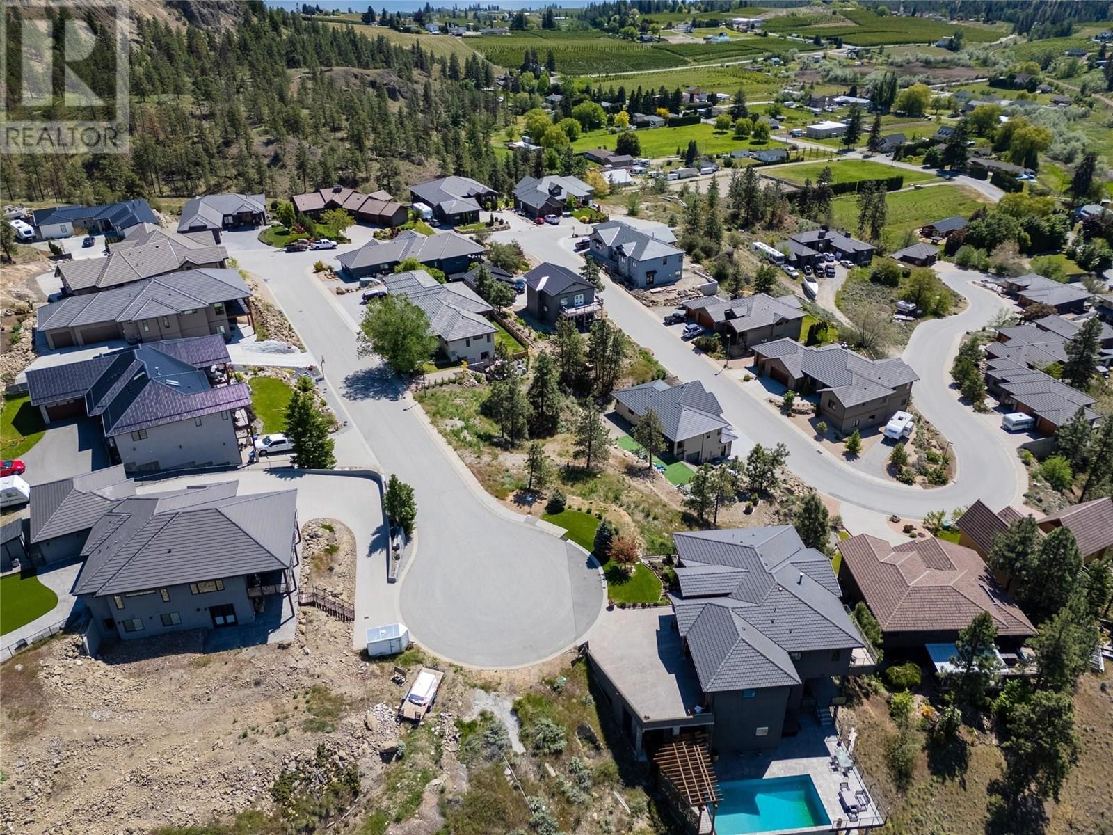 View of lot & neighbourhood. - 6709 Victoria Road S Lot# 13, Summerland, BC