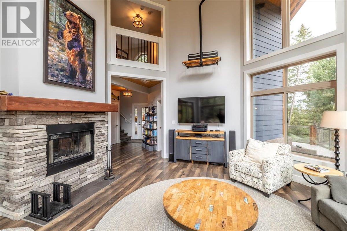 9942 Osprey Landing Drive, Wardner, BC - Indoor Photo Showing Living Room With Fireplace