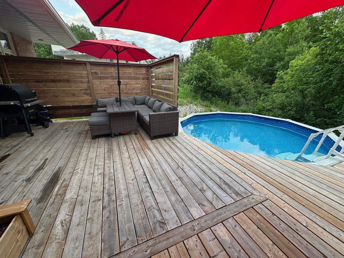 Patio - 835 Ch. Kipawa, Témiscaming, QC - Outdoor With Above Ground Pool With Deck Patio Veranda With Exterior