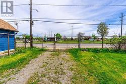 GATED SIDE ENTRANCE OFF OF MELLANBY RD -