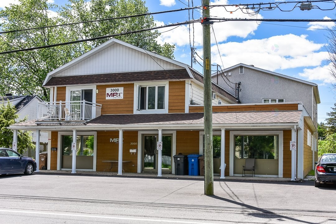 Façade - 3000 Ch. Ste-Thérèse, Carignan, QC - Outdoor With Deck Patio Veranda