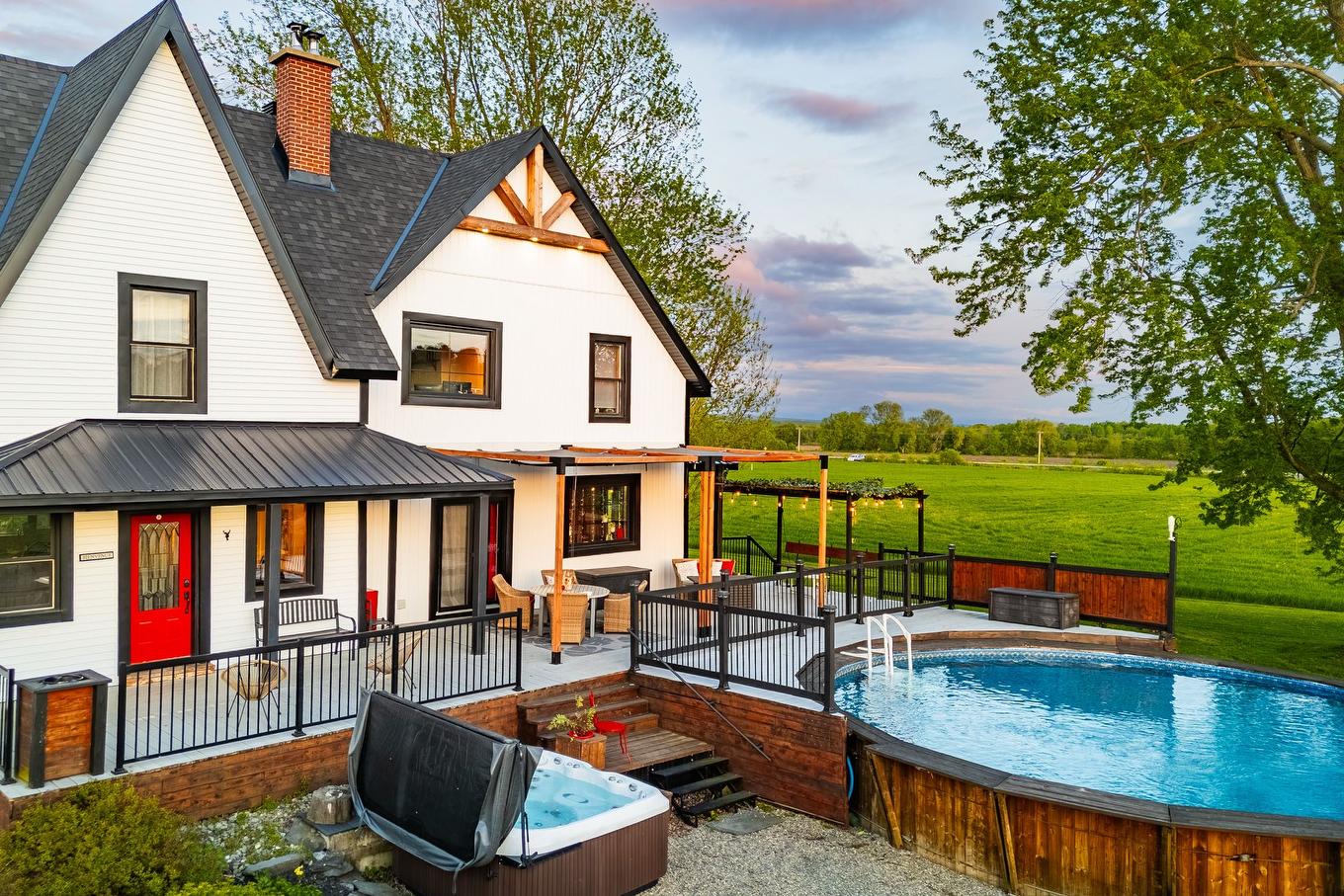 Back facade - 99 Ch. De La Station, Compton, QC - Outdoor With Above Ground Pool