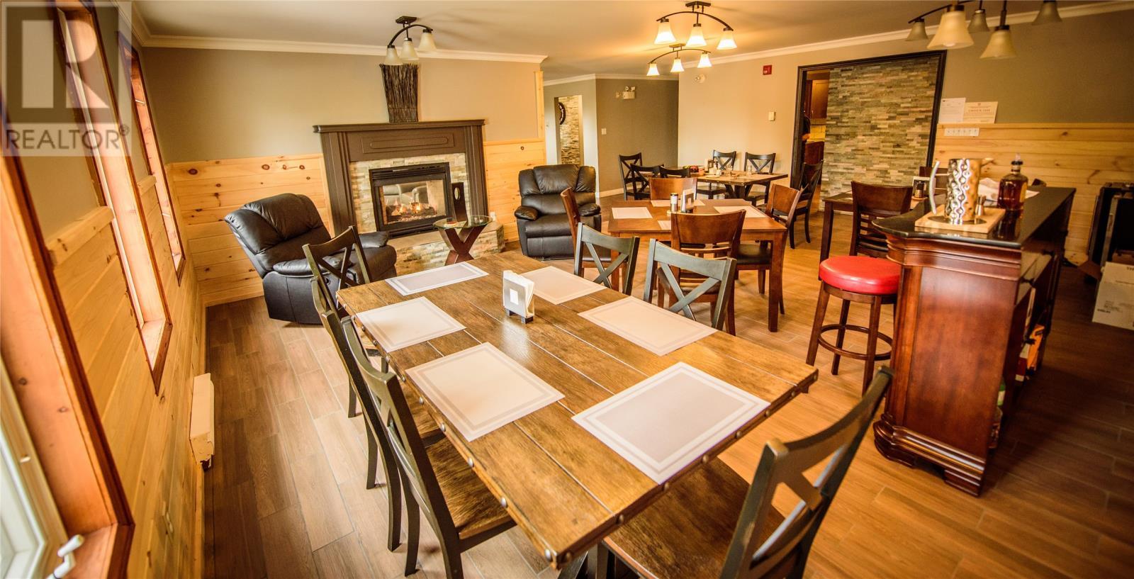 0 Sir Richard Squires Park, Cormack, NL - Indoor Photo Showing Dining Room With Fireplace