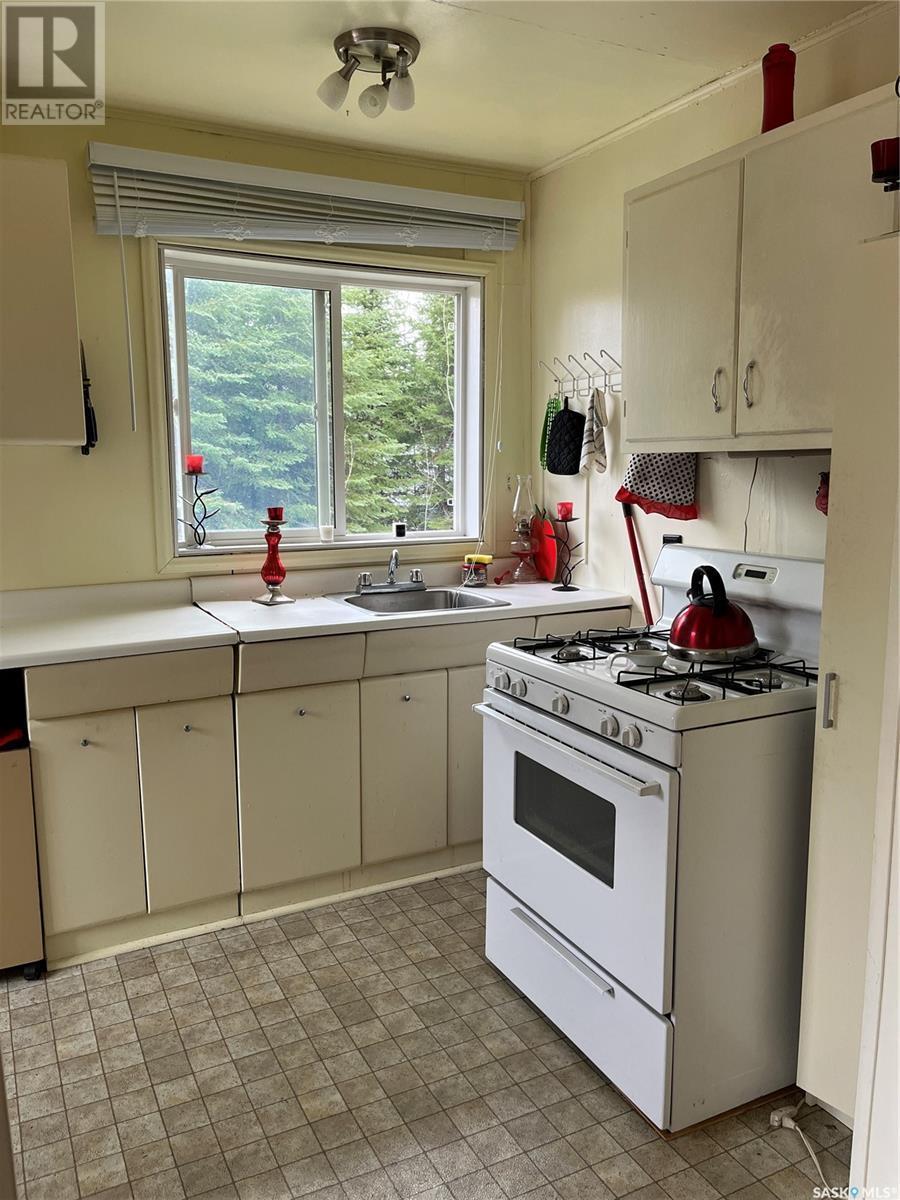 3 Feszyk Drive, Dore Lake, SK - Indoor Photo Showing Kitchen With Double Sink