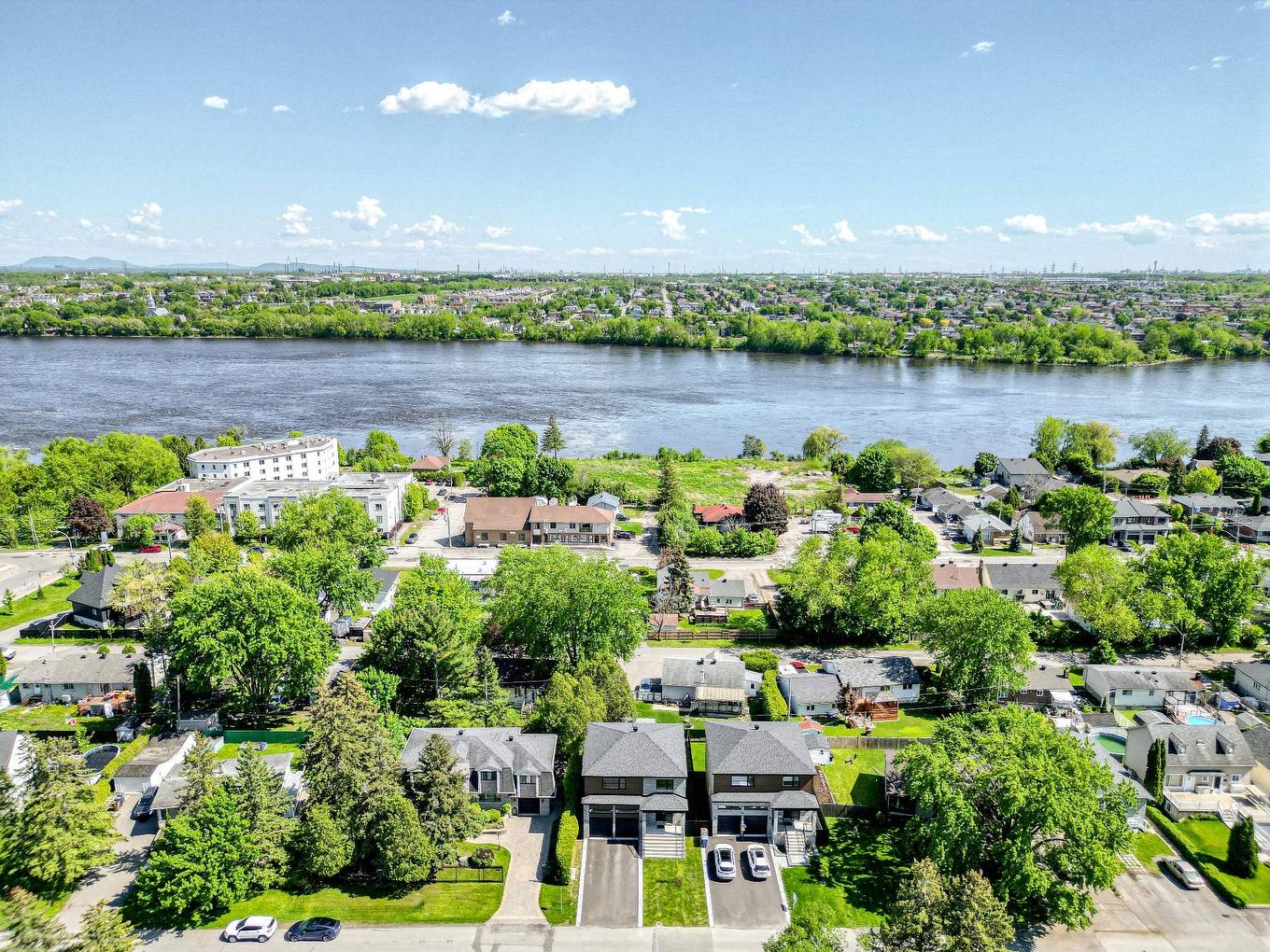 Aerial photo - 8490 Rue Duceppe, Laval (Saint-François), QC - Outdoor With Body Of Water With View