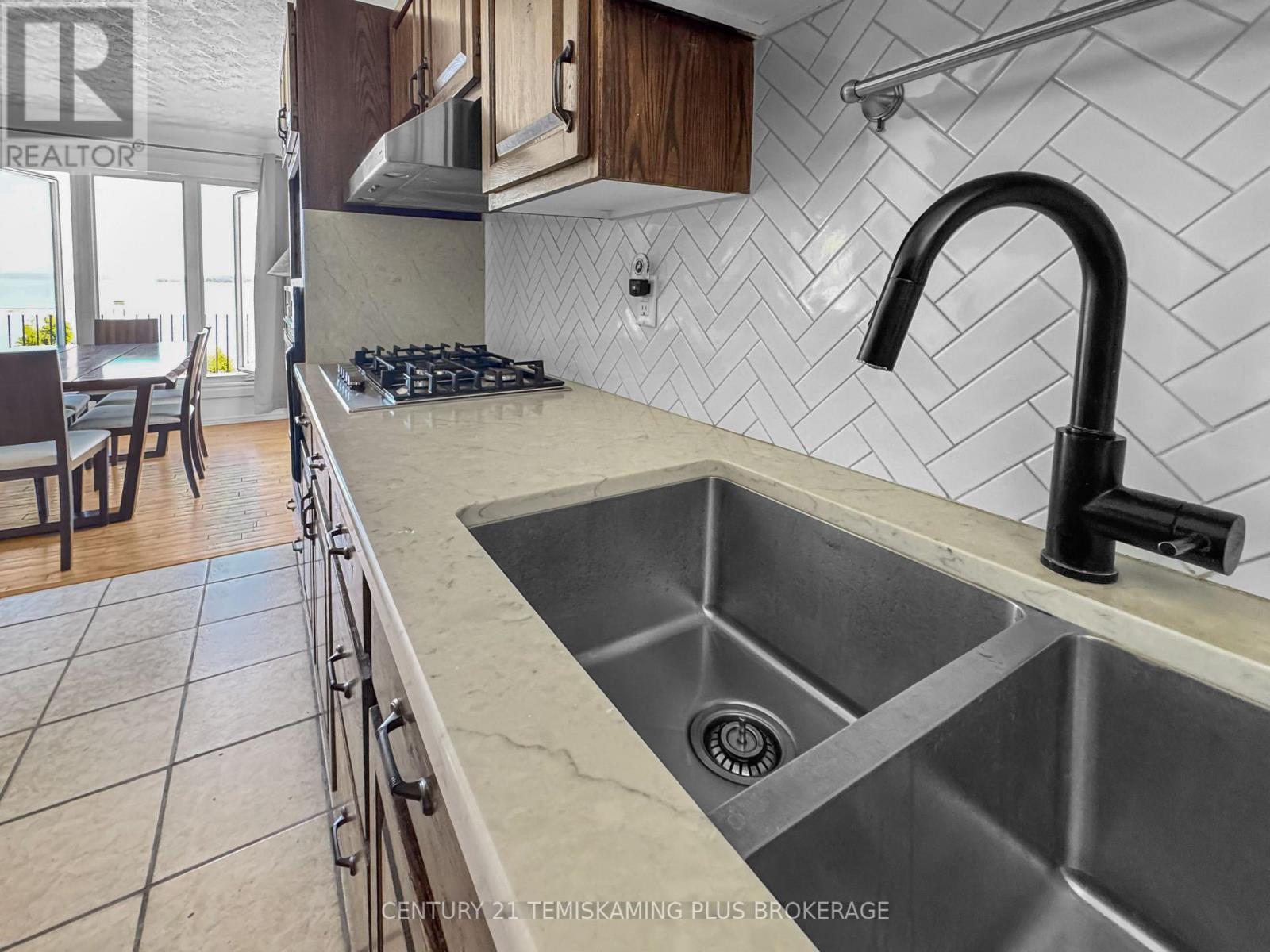 501178 Berry Road, Timiskaming (Tim - Outside - Rural), ON - Indoor Photo Showing Kitchen With Double Sink
