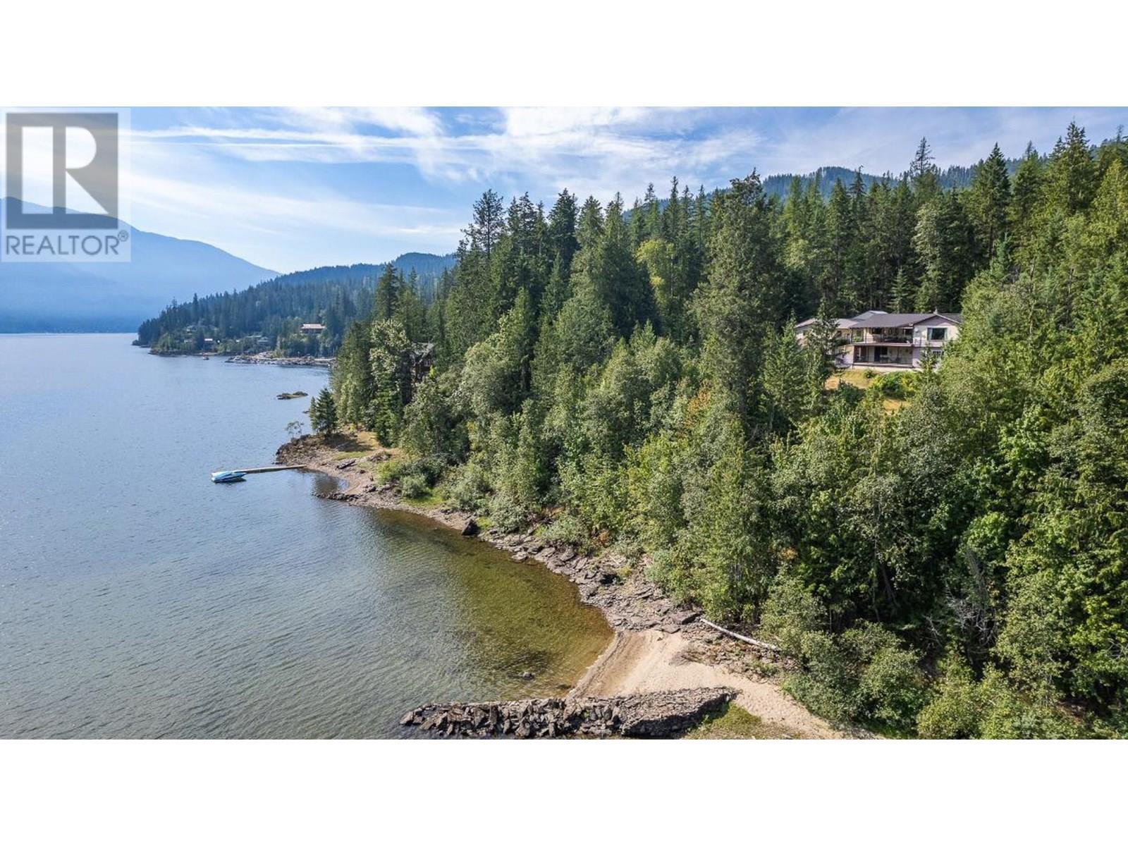 3.37 Acres with hundreds of fee to lakeshore! - 15730 Peters Road, Crawford Bay, BC - Outdoor With Body Of Water With View