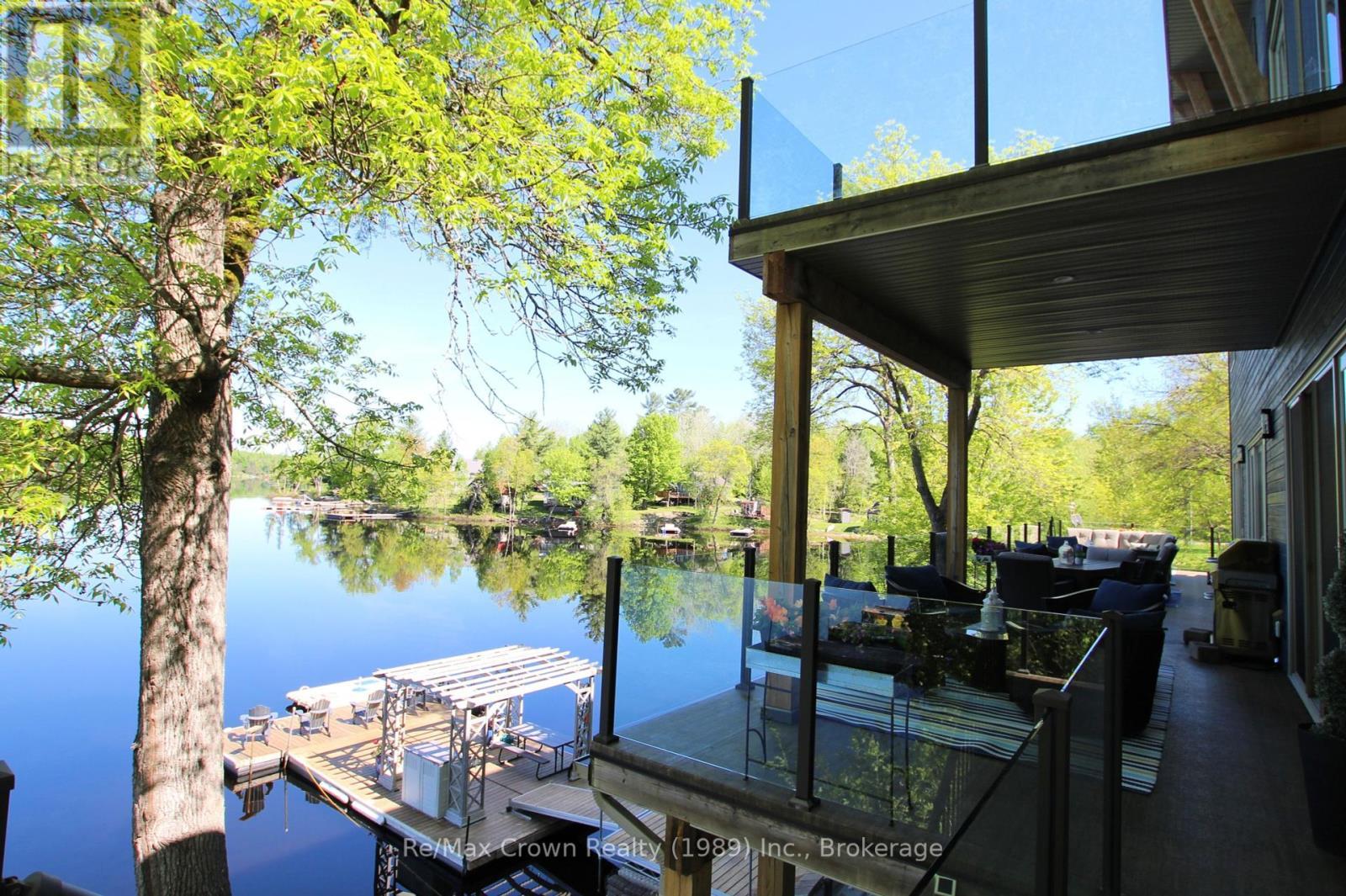 7313 Highway 534 Highway, Parry Sound Remote Area (Restoule), ON - Outdoor With Body Of Water With Deck Patio Veranda