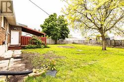 backyard, man door to garage -