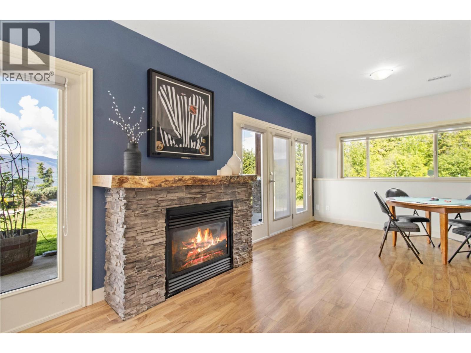 3240 Roncastle Road, Blind Bay, BC - Indoor Photo Showing Living Room With Fireplace