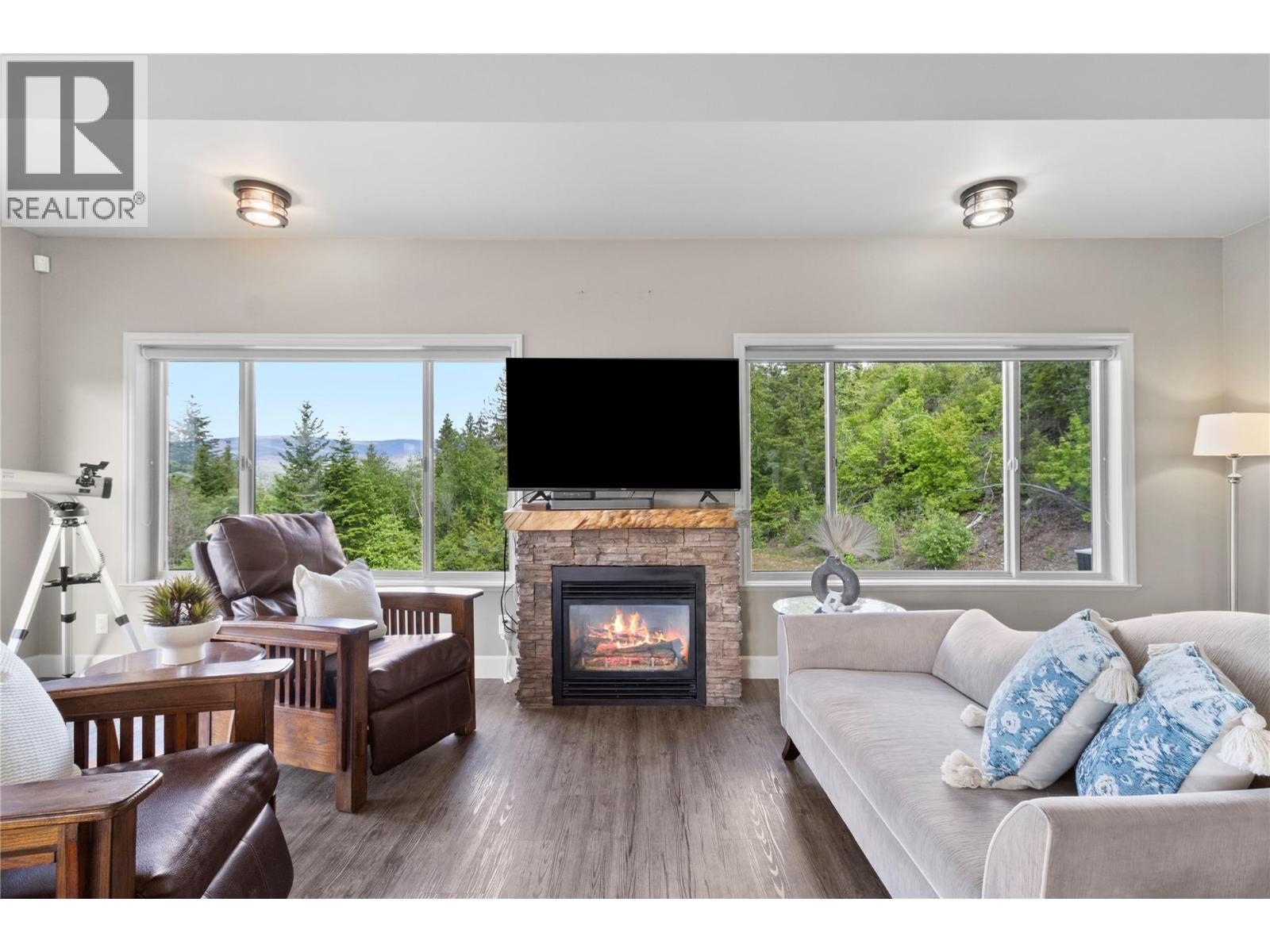 3240 Roncastle Road, Blind Bay, BC - Indoor Photo Showing Living Room With Fireplace