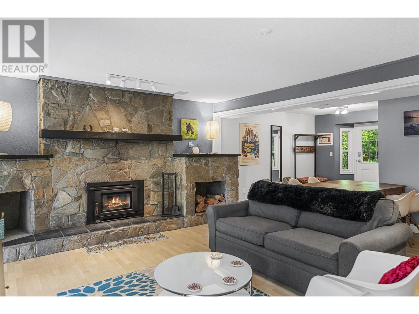 Suite Living Room - 1640 Galt Crescent, Revelstoke, BC - Indoor Photo Showing Living Room With Fireplace
