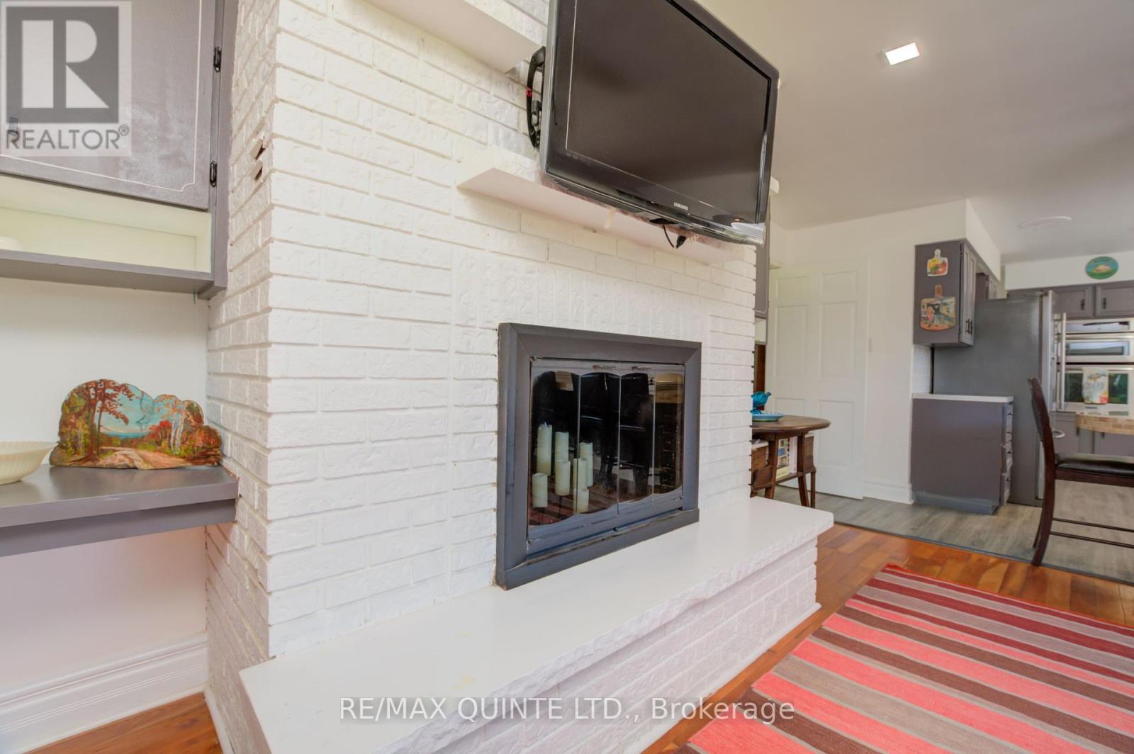25 Singleton Street, Brighton, ON - Indoor With Fireplace