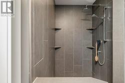 primary bath walk in tiled shower -
