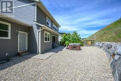back of home illustrating man door from garage -