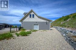 double door access from garage to side-yard. Fully fenced -