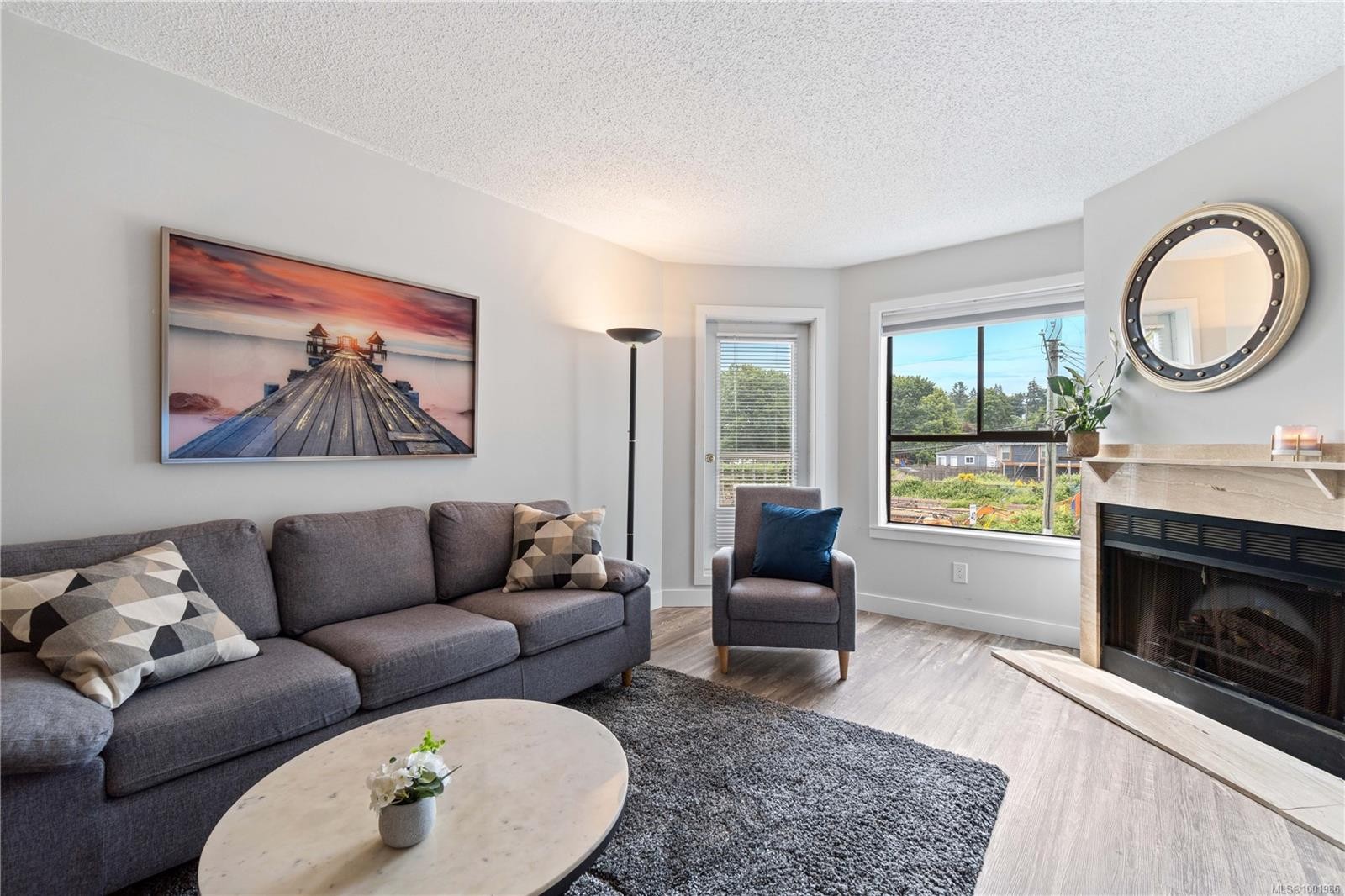 213-2815 Departure Bay Rd, Nanaimo, BC - Indoor Photo Showing Living Room With Fireplace