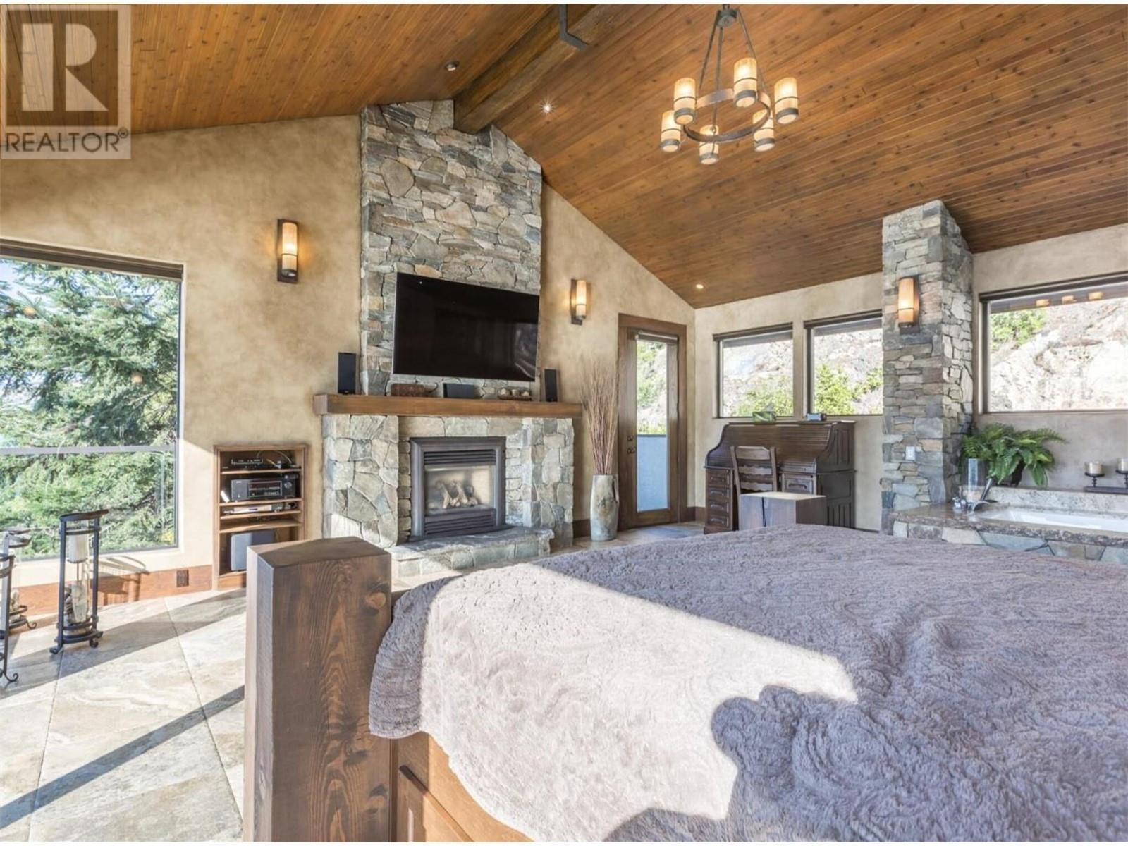 15010 & 15020 Tamarack Drive, Coldstream, BC - Indoor With Fireplace