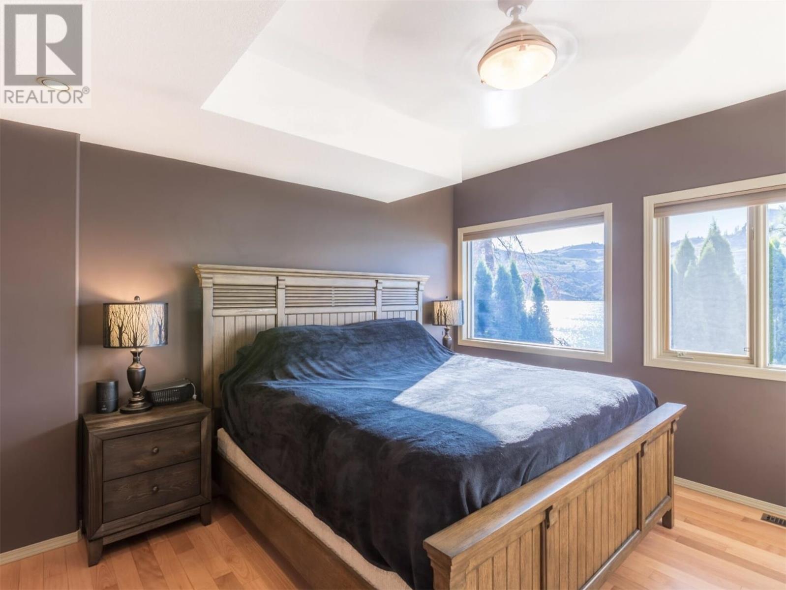 15010 & 15020 Tamarack Drive, Coldstream, BC - Indoor Photo Showing Bedroom