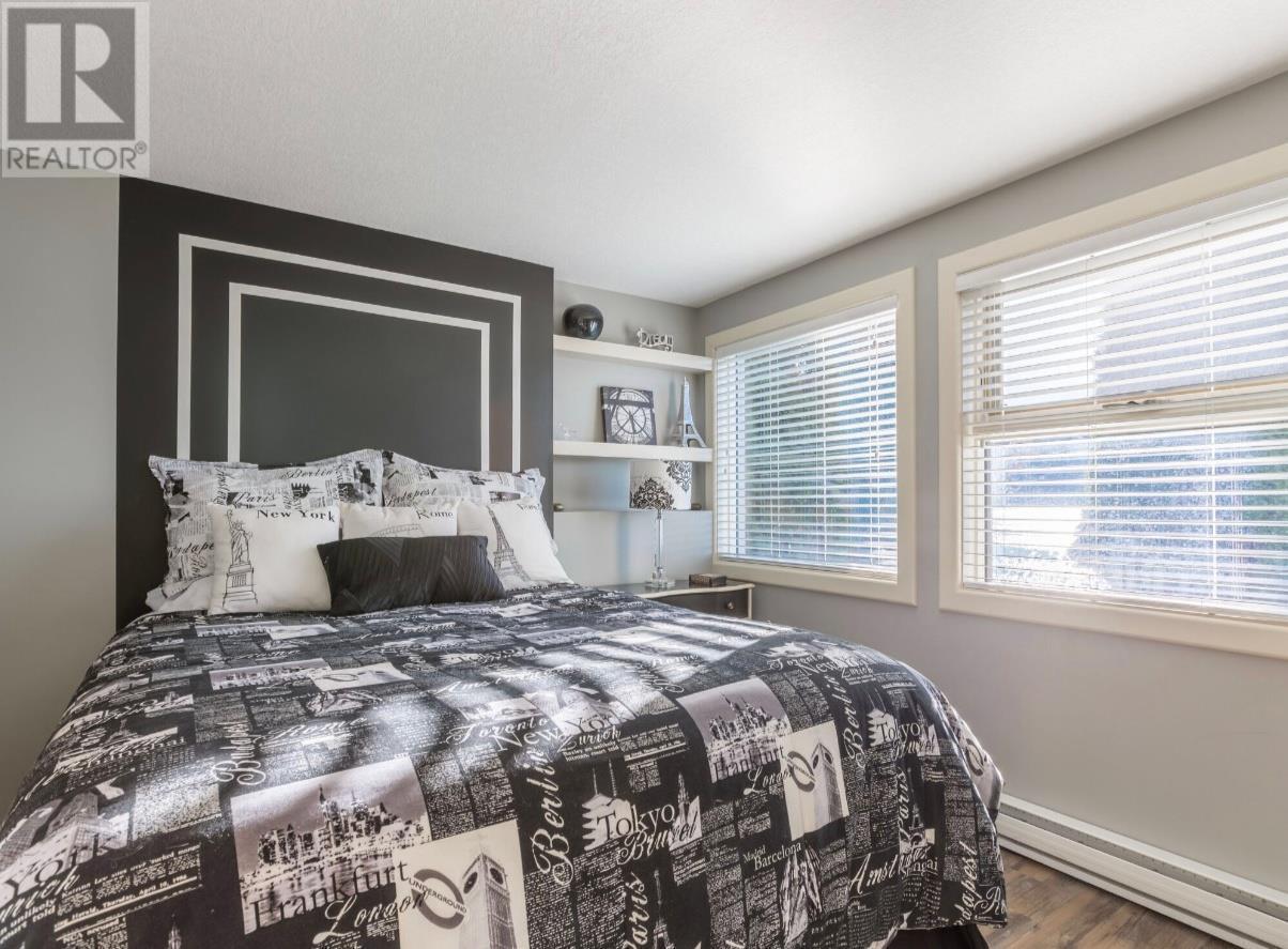 15010 & 15020 Tamarack Drive, Coldstream, BC - Indoor Photo Showing Bedroom