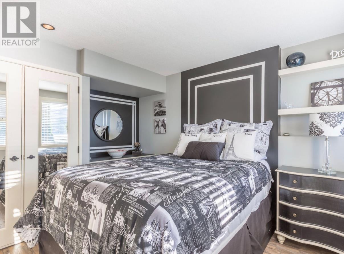 15010 & 15020 Tamarack Drive, Coldstream, BC - Indoor Photo Showing Bedroom