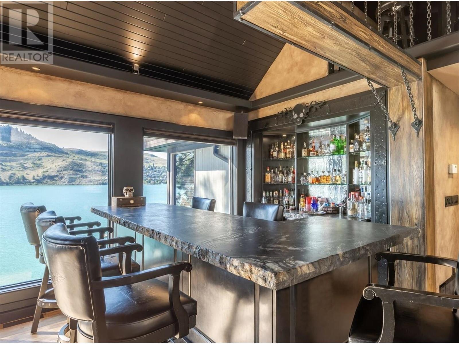 15010 & 15020 Tamarack Drive, Coldstream, BC - Indoor Photo Showing Dining Room With Body Of Water