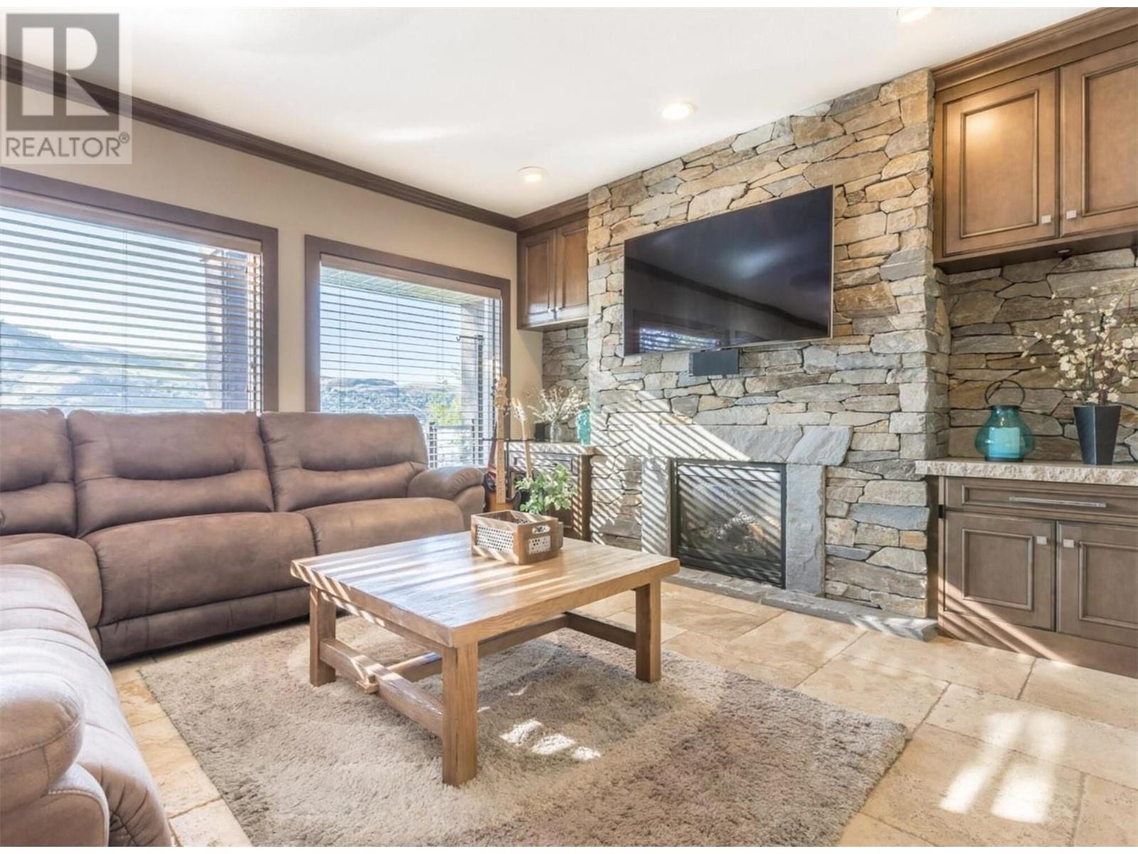 15010 & 15020 Tamarack Drive, Coldstream, BC - Indoor Photo Showing Living Room With Fireplace