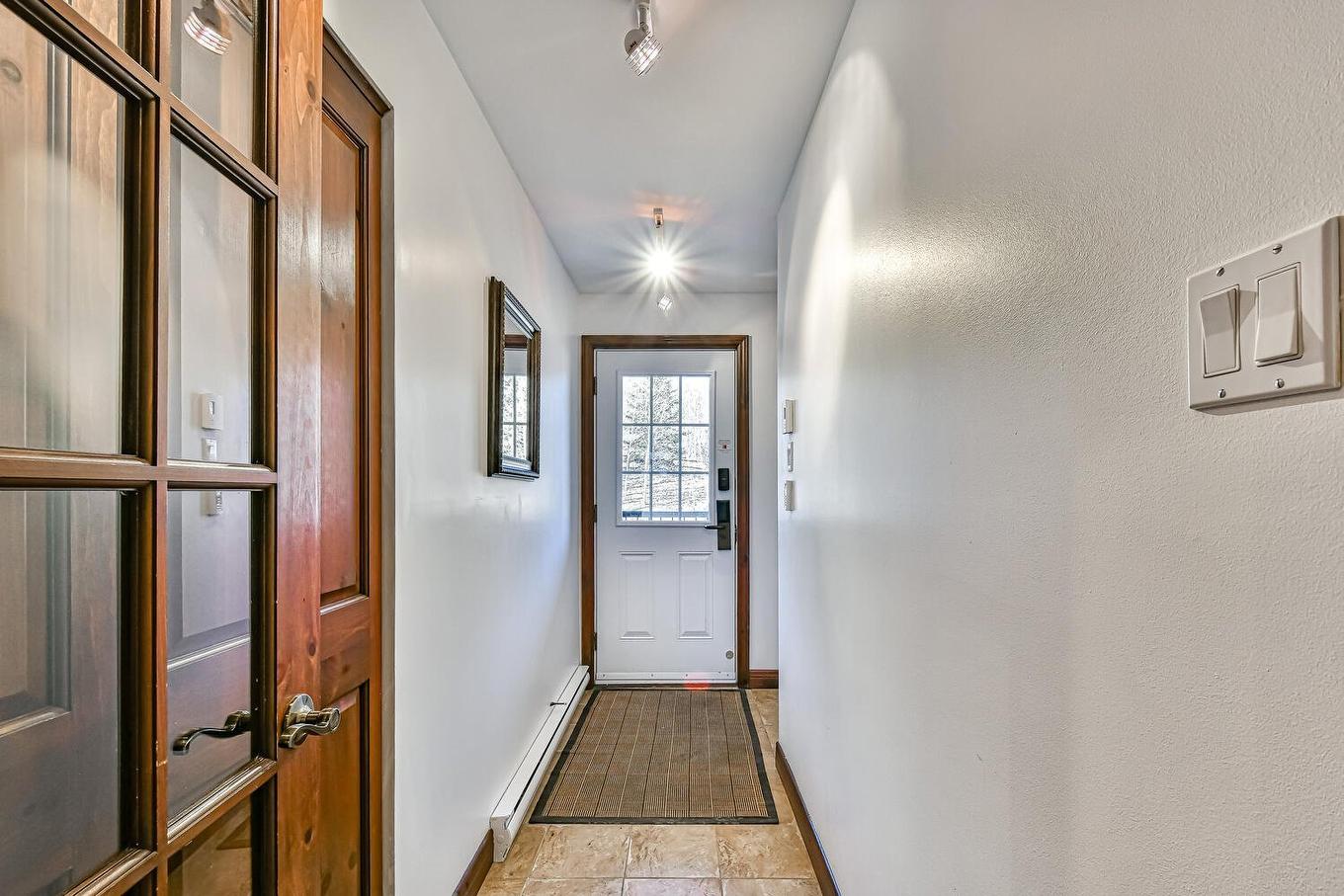 Hall d'entrée/Vestibule - 4-250 Rue Du Mont-Plaisant, Mont-Tremblant, QC - Indoor Photo Showing Other Room