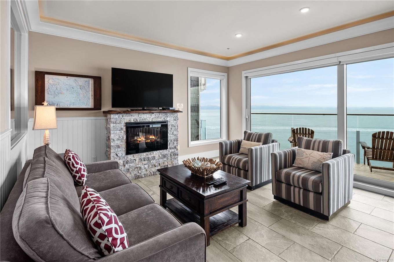 42B-1000 Sookepoint Pl, Sooke, BC - Indoor Photo Showing Living Room With Fireplace
