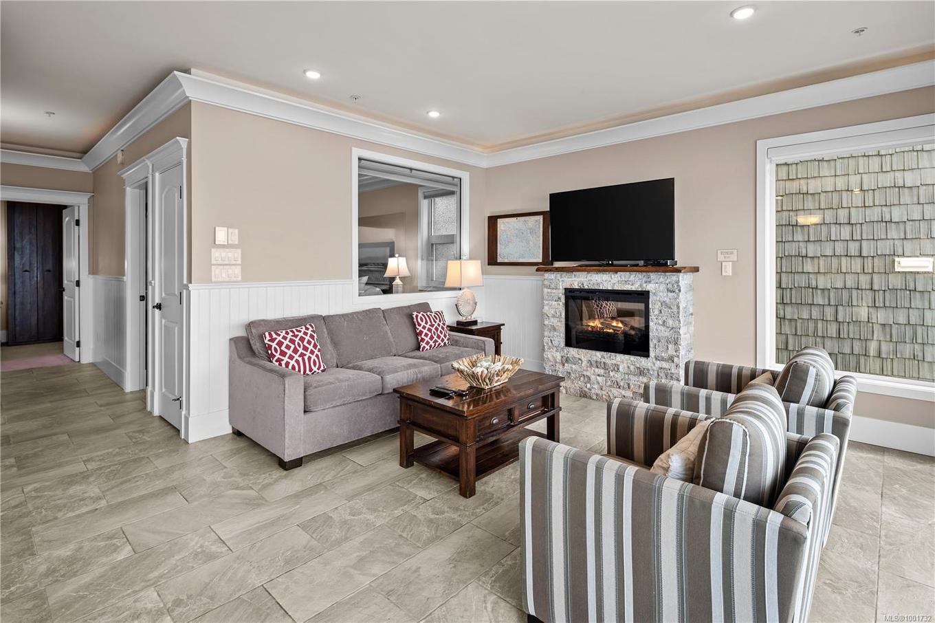 42B-1000 Sookepoint Pl, Sooke, BC - Indoor Photo Showing Living Room With Fireplace