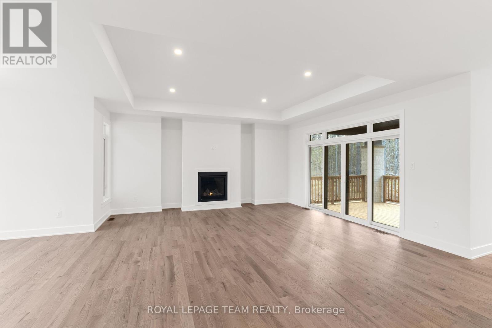 Similar model image; builder variations possible. - 79 Hogan Drive, Mcnab/Braeside, ON - Indoor With Fireplace