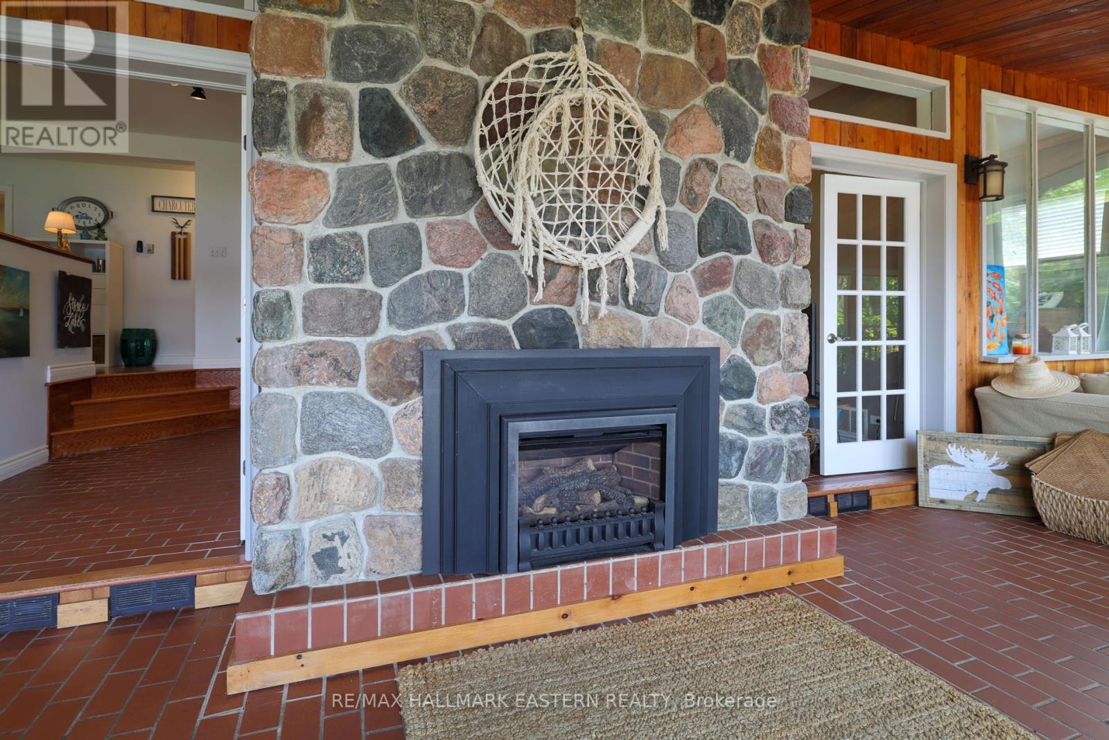 2310 Salmon Bay Road, Douro-Dummer, ON - Indoor Photo Showing Living Room With Fireplace