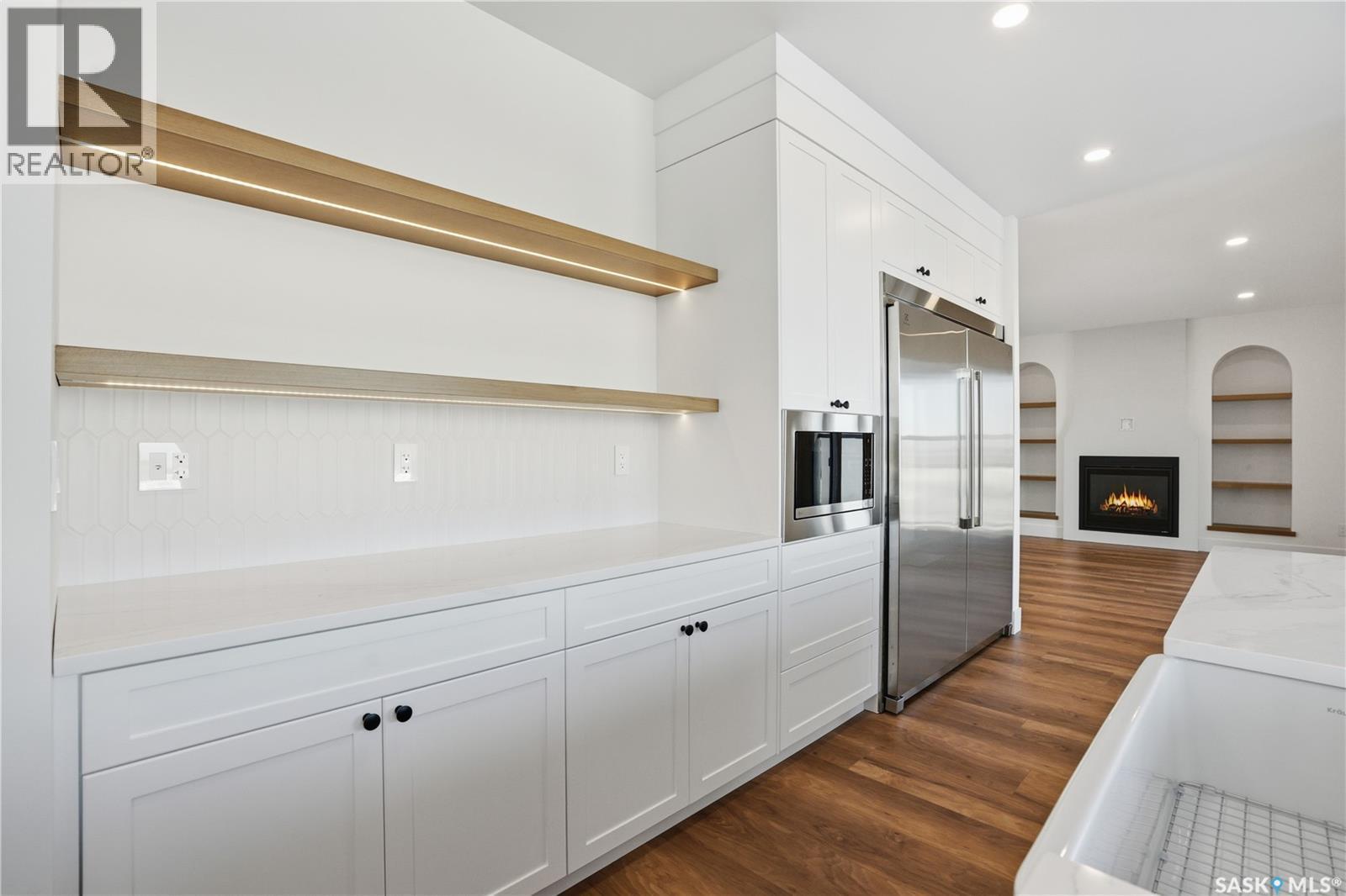 436 Augusta Boulevard, Warman, SK - Indoor Photo Showing Other Room With Fireplace